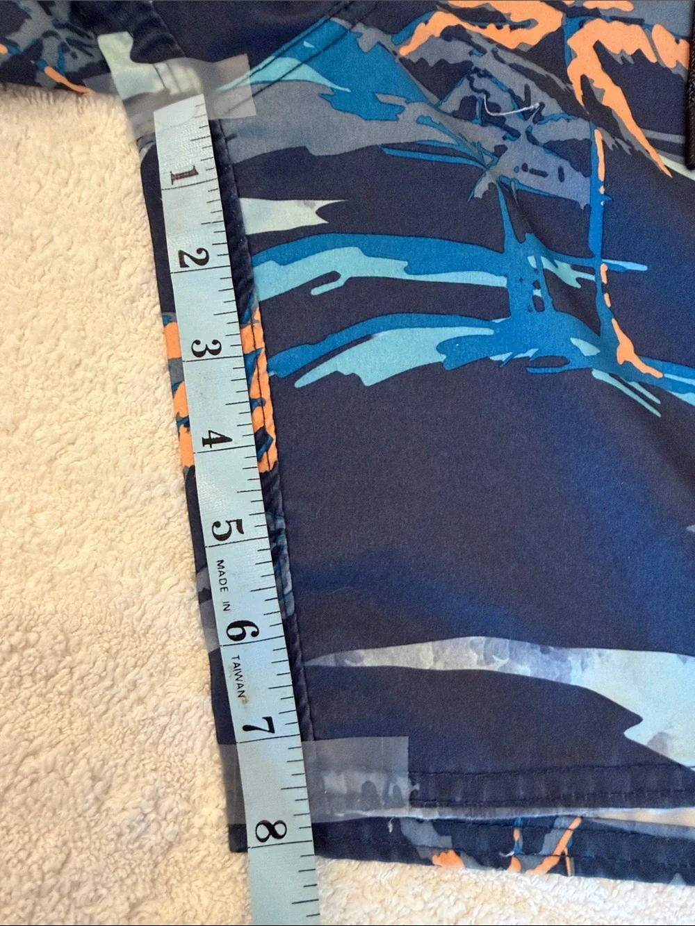 O’Neill bathing suit with two pockets one back pocket with Velcro
